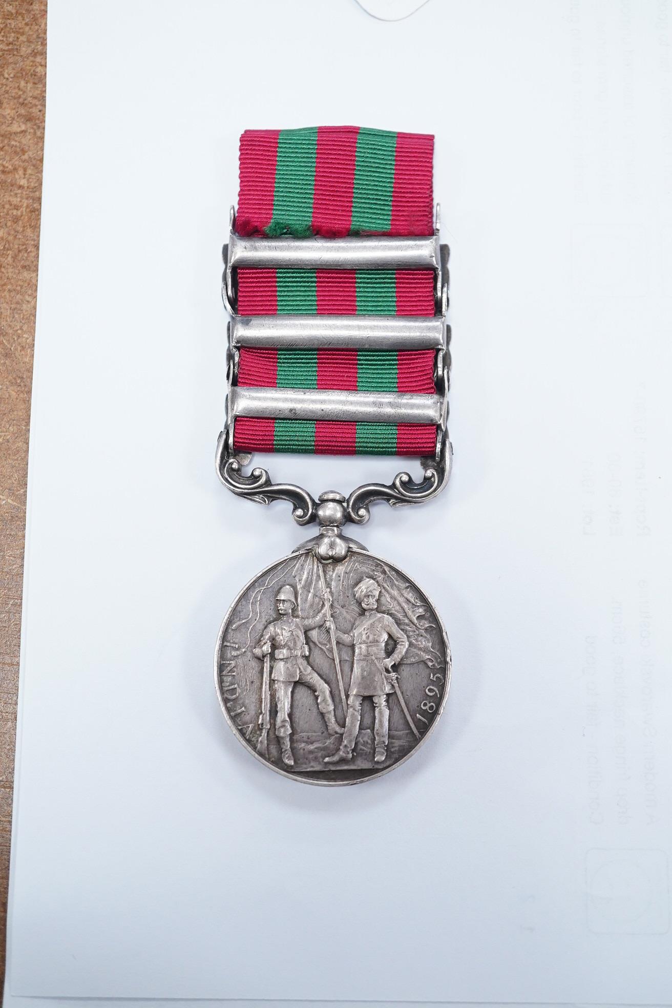 An India General Service medal 1895-1902 awarded to 4695 Pte J Wood 2nd, 13th King's Own Scottish Borders, with Tireh 1897-98, Punjab frontier 1897-98 and relief of Chitral 1895 clasps. Condition - fair to good